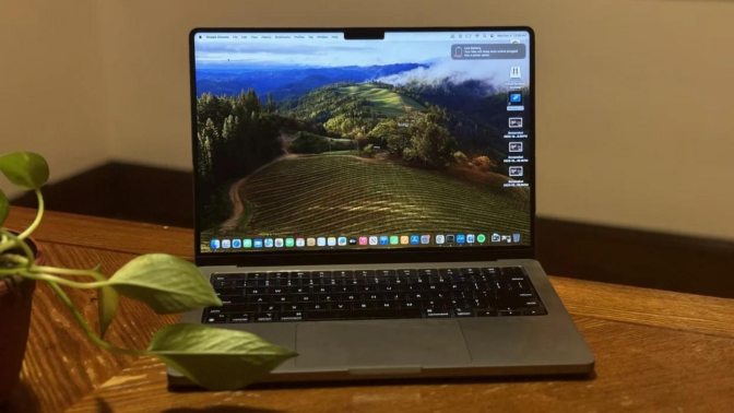 A MacBook Pro sitting on a desk