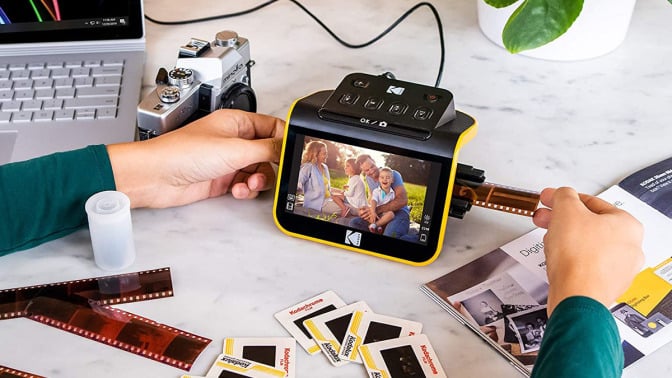 photographer using kodak film scanner