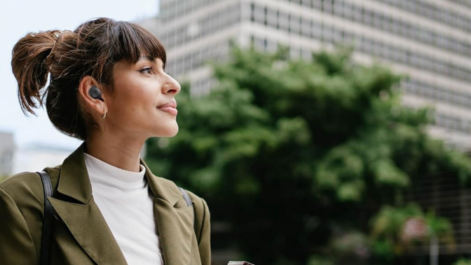 woman wearing Samsung galaxy earbuds 