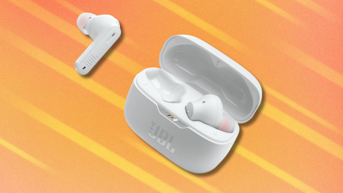 JBL Tune earbuds on abstract orange background