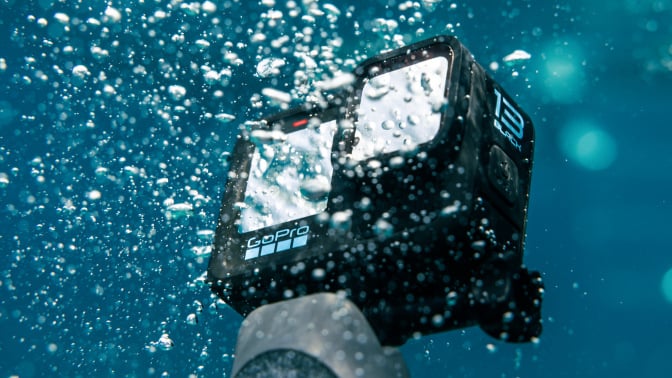 gopro hero13 black camera underwater with air bubbles