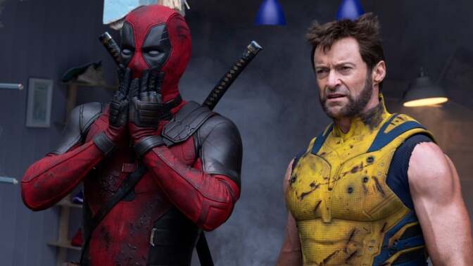 Deadpool and Wolverine prepare for battle.