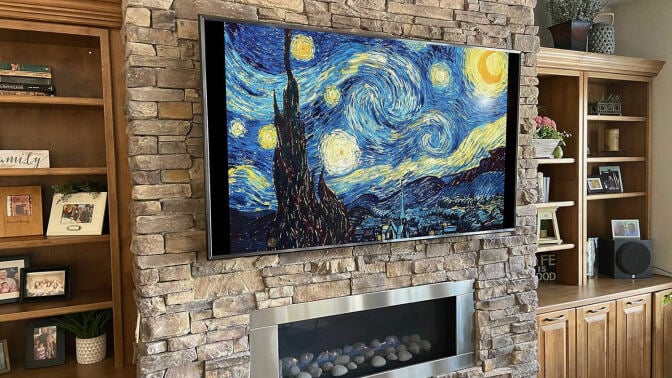 tv displaying vincent van gogh's starry night