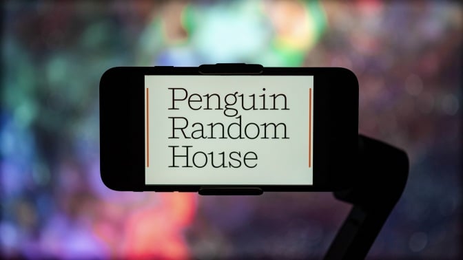 The Penguin Random House logo on a phone.