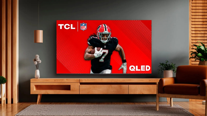 TCL QLED TV on blue wall in living room scene