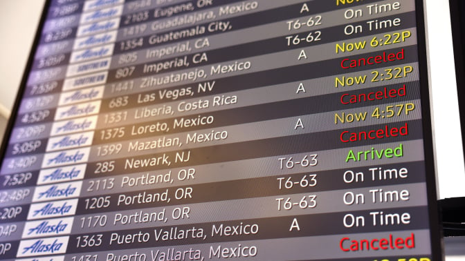 image of delayed and cancelled flights on board