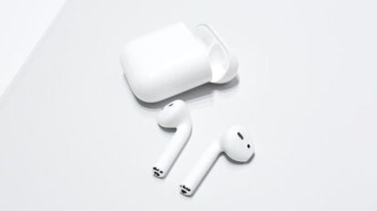 Apple AirPods on a white background.