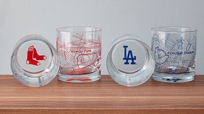 Baseball park map glasses on a table.