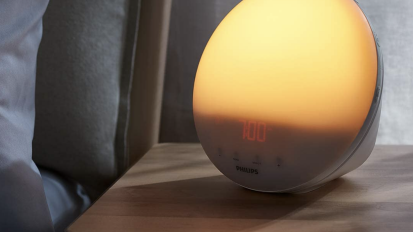 A Philips SmartSleep on a bedside table.