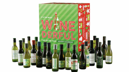 group of wine bottles beside box